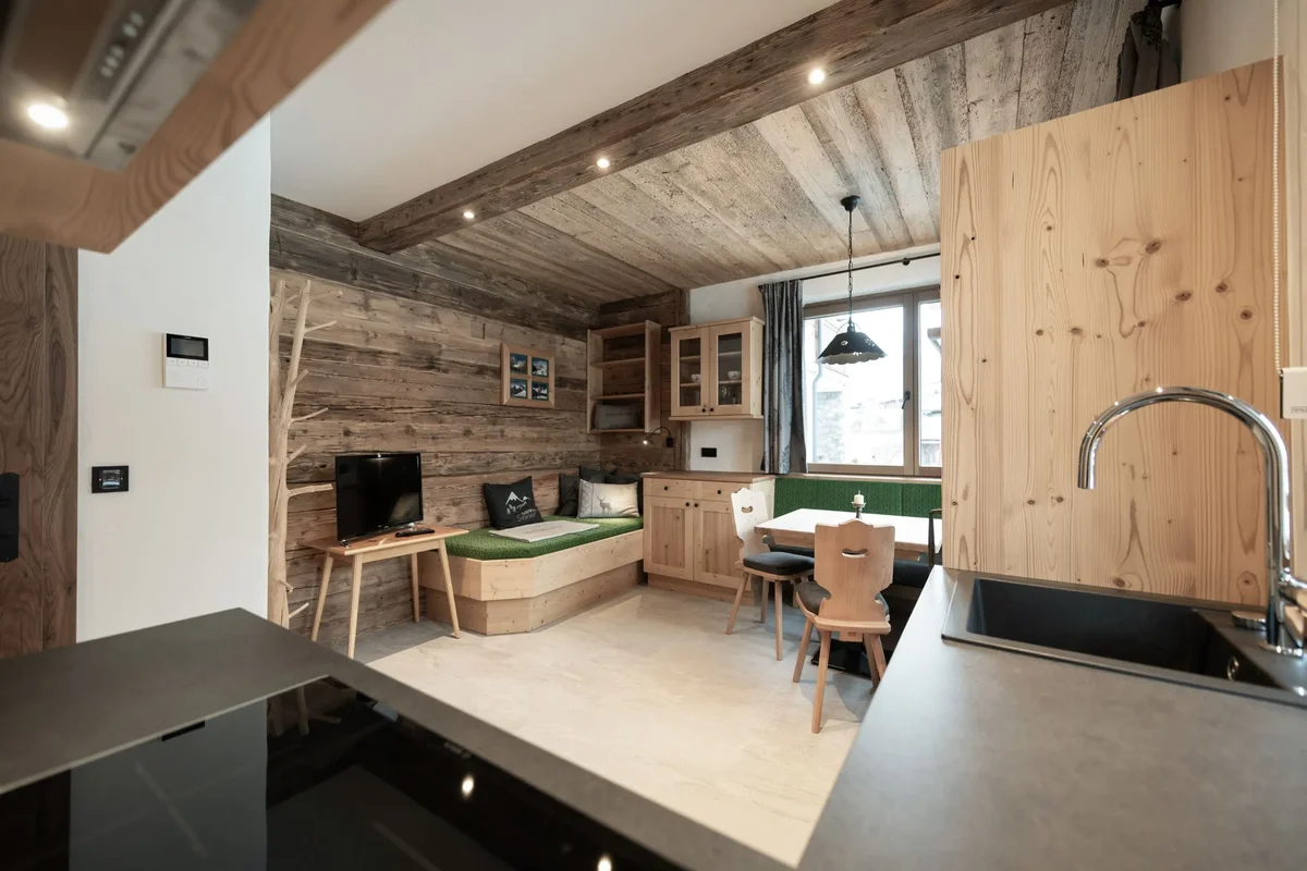 Dining and living room in Chalet Holzi